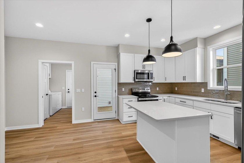 Move-in ready and beautifully designed, this stunning Swan Creek - photo 18