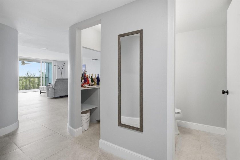 This spacious 3-bedroom, 2.5-bath corner unit in the gated *18th - photo 13