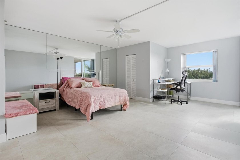 This spacious 3-bedroom, 2.5-bath corner unit in the gated *18th - photo 18