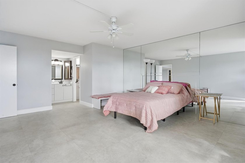This spacious 3-bedroom, 2.5-bath corner unit in the gated *18th - photo 19