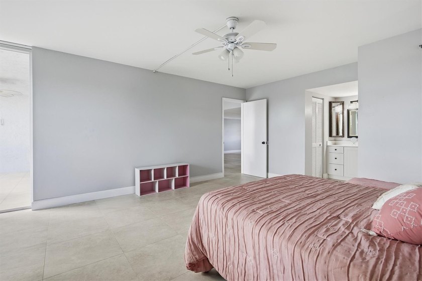 This spacious 3-bedroom, 2.5-bath corner unit in the gated *18th - photo 20
