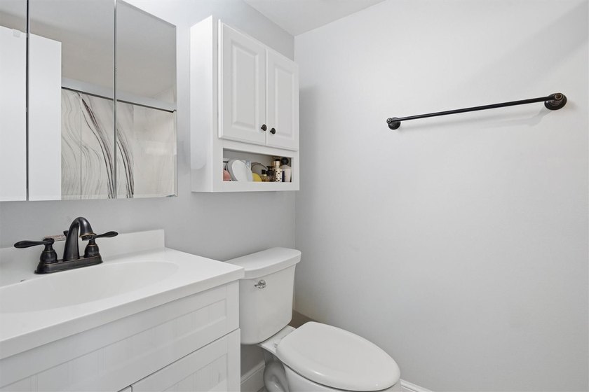 This spacious 3-bedroom, 2.5-bath corner unit in the gated *18th - photo 23