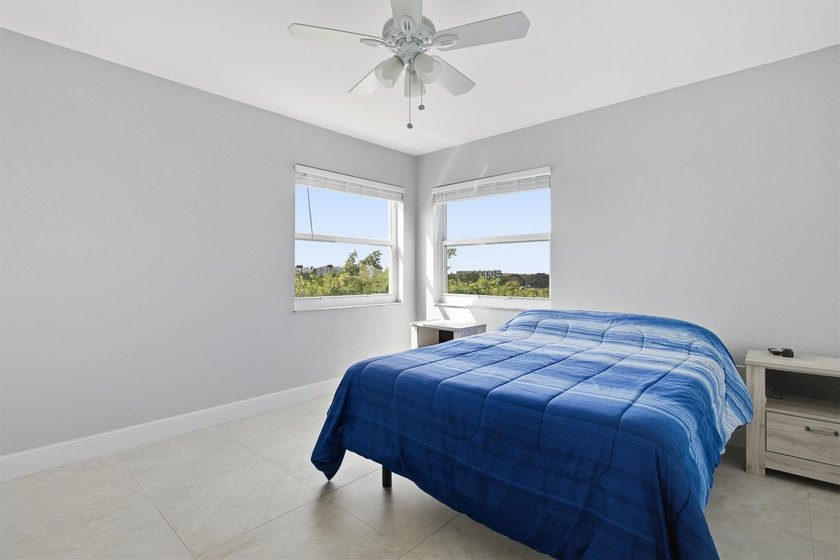 This spacious 3-bedroom, 2.5-bath corner unit in the gated *18th - photo 24