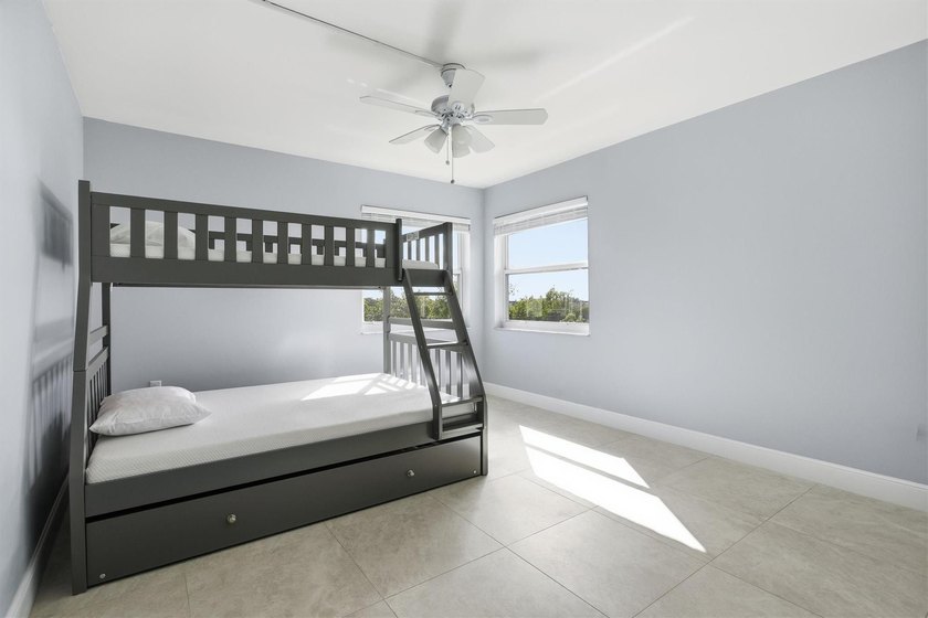 This spacious 3-bedroom, 2.5-bath corner unit in the gated *18th - photo 27