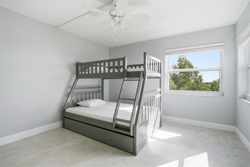 This spacious 3-bedroom, 2.5-bath corner unit in the gated *18th - photo 28