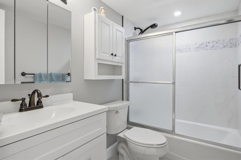 This spacious 3-bedroom, 2.5-bath corner unit in the gated *18th - photo 29