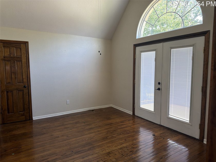 Set on 1.48 wooded acres along Lake Limestone, this custom stone - photo 21