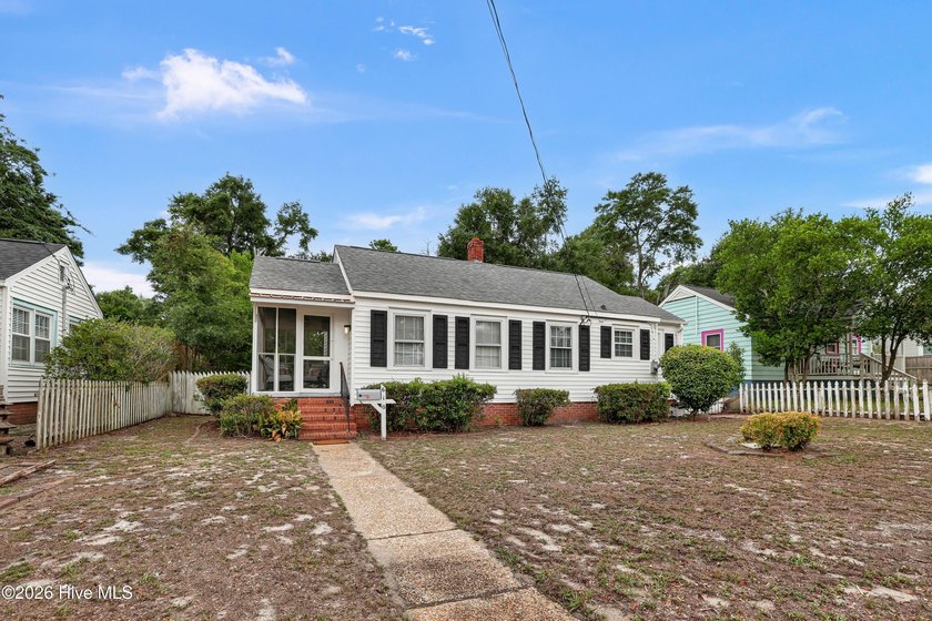 Charming 3-bedroom, 1.5-bath home nestled in the established - photo 2