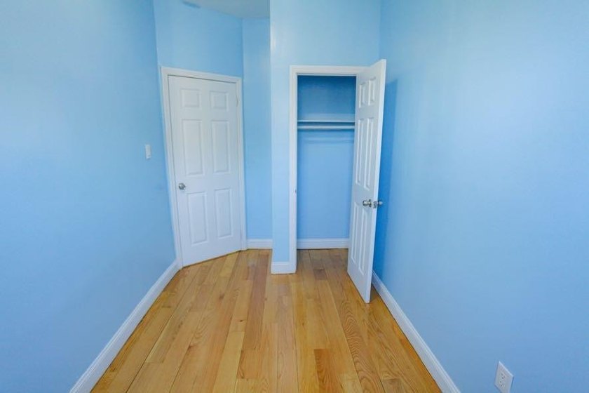 This well-maintained legal two-family, 6 bedroom, 3 bath brick - photo 21