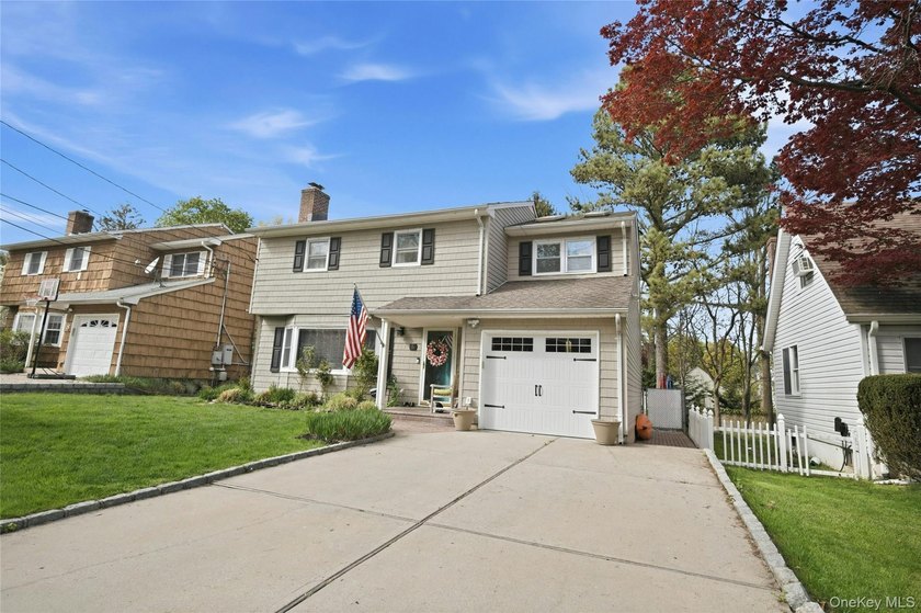 Welcome to this beautifully updated home in Crab Meadow where - photo 2