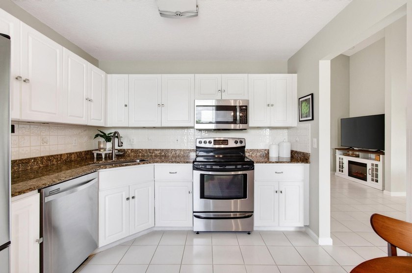 Enjoy peaceful lake views from this beautifully maintained home - photo 25