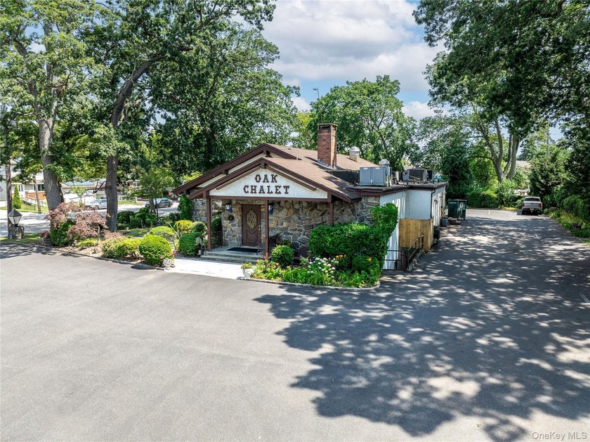 Nestled in the heart of Bellmore, New York, welcome to Oak - photo 5
