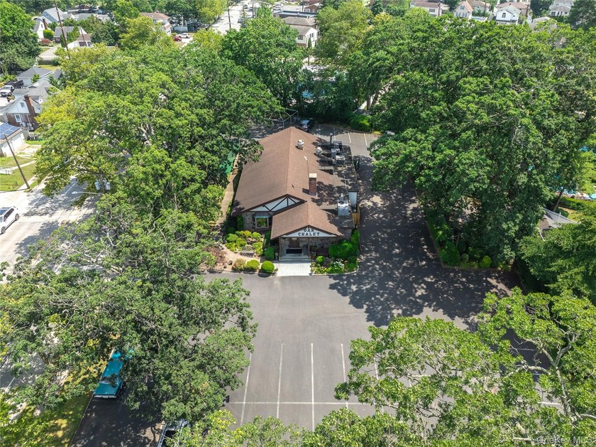 Nestled in the heart of Bellmore, New York, welcome to Oak - photo 8