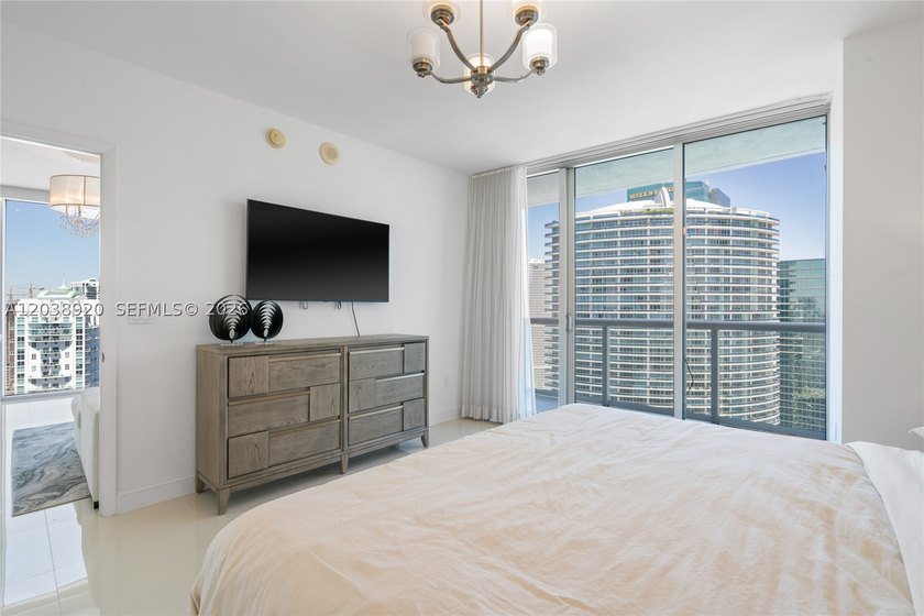 Experience luxury living at Icon Brickell Tower I. This bright - photo 11