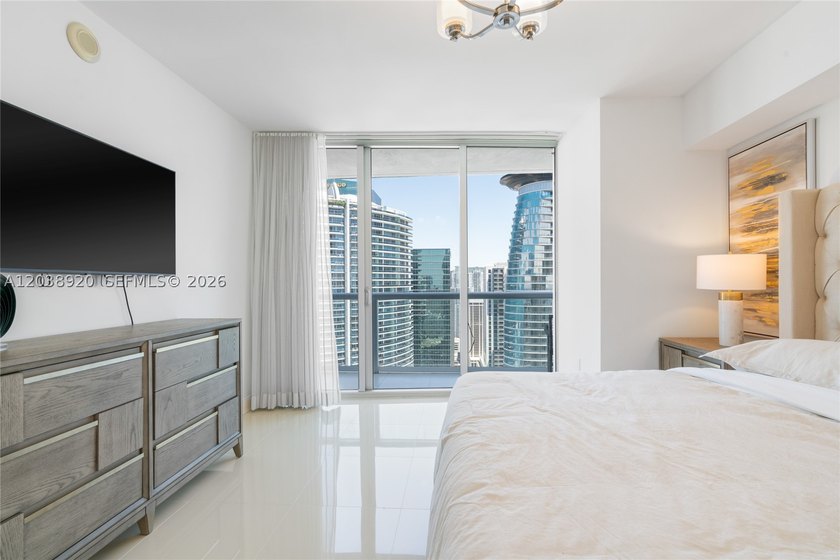Experience luxury living at Icon Brickell Tower I. This bright - photo 12