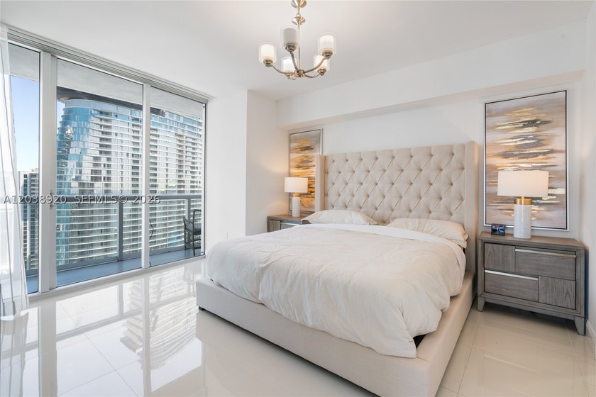 Experience luxury living at Icon Brickell Tower I. This bright - photo 13