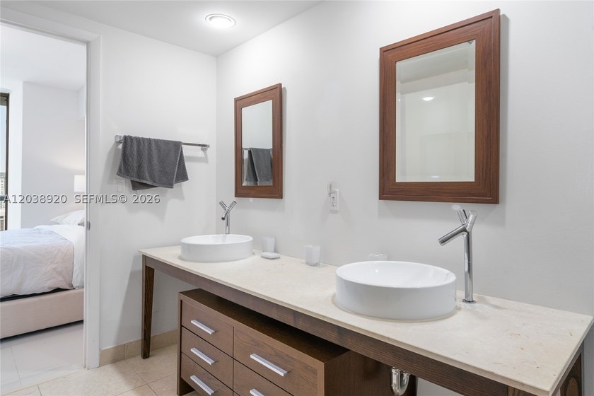 Experience luxury living at Icon Brickell Tower I. This bright - photo 15