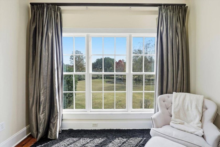 A rare private waterfront estate tucked inside Twin Cedars. Set - photo 16