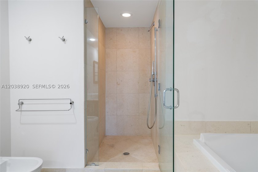 Experience luxury living at Icon Brickell Tower I. This bright - photo 17