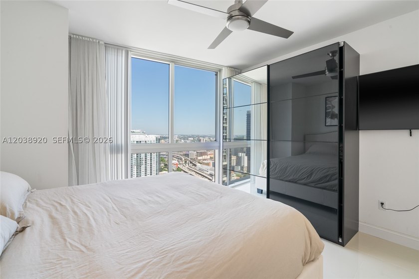 Experience luxury living at Icon Brickell Tower I. This bright - photo 30