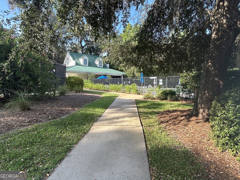 Build your dream home beneath a canopy of majestic live oaks in - photo 8