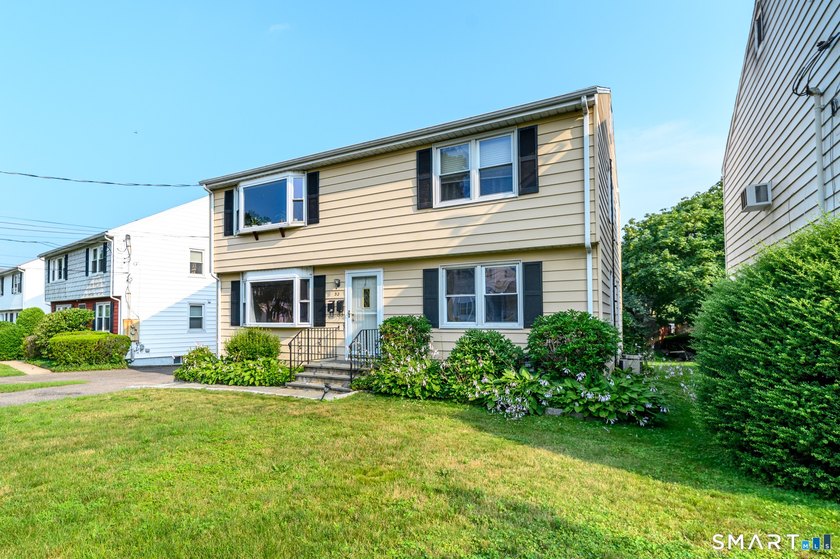 Excellent opportunity to own a well-maintained two-family home - photo 3