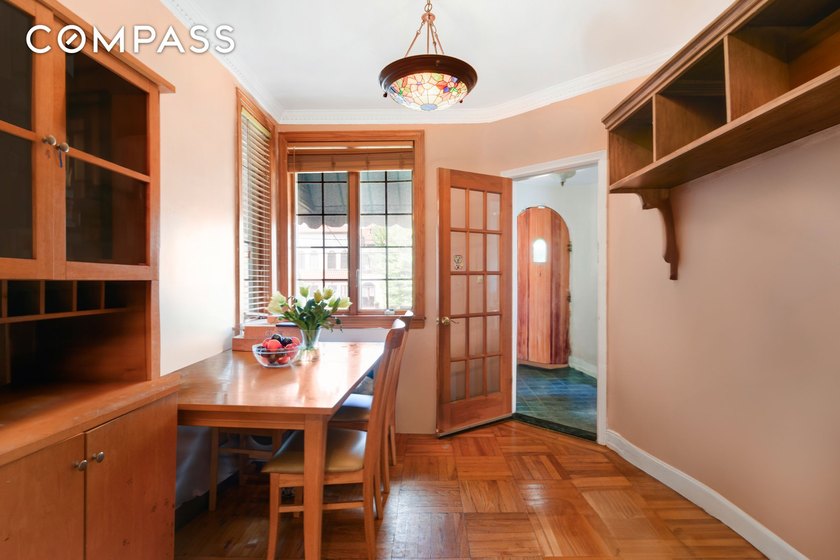 Discover the timeless appeal of this elegant, fully-brick - photo 4