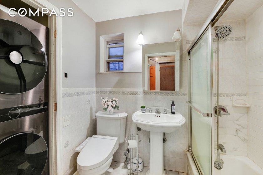 Discover the timeless appeal of this elegant, fully-brick - photo 7
