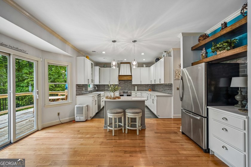 Lake Lanier convenience without the high price tag! Nestled on a - photo 8