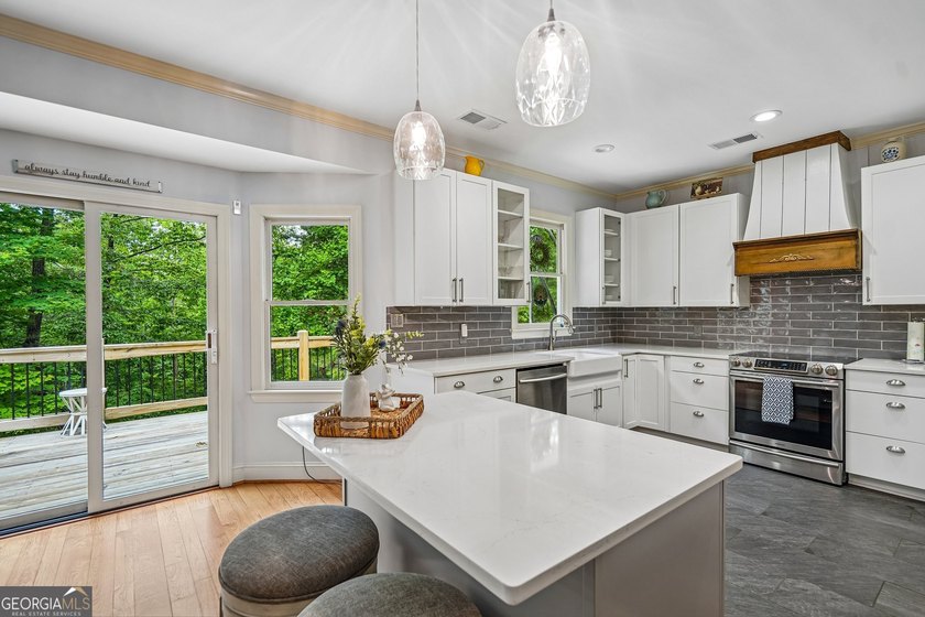 Lake Lanier convenience without the high price tag! Nestled on a - photo 9