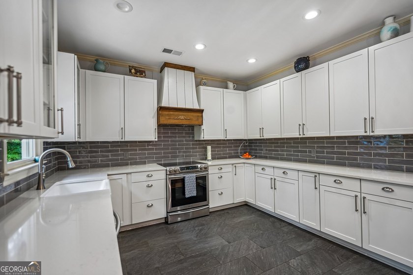 Lake Lanier convenience without the high price tag! Nestled on a - photo 10