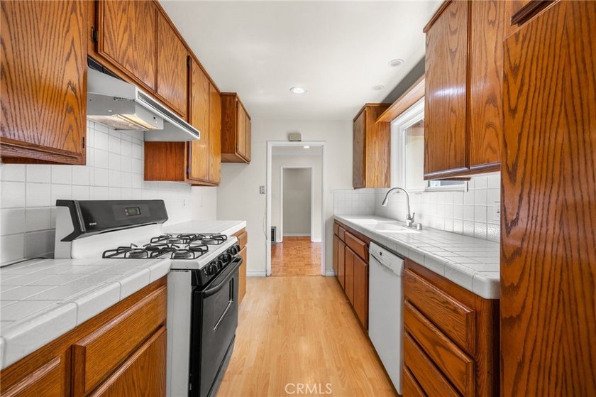 This corner lot, 3 Bedroom, 2 and 1/2 bath is in the popular Los - photo 18