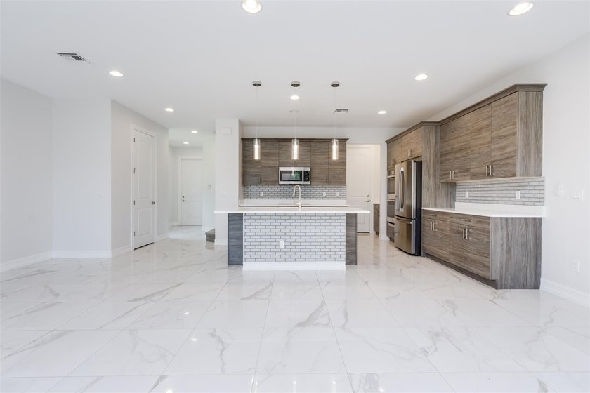 You will LOVE this stunning Lake Front Corner Townhouse. 3 - photo 13