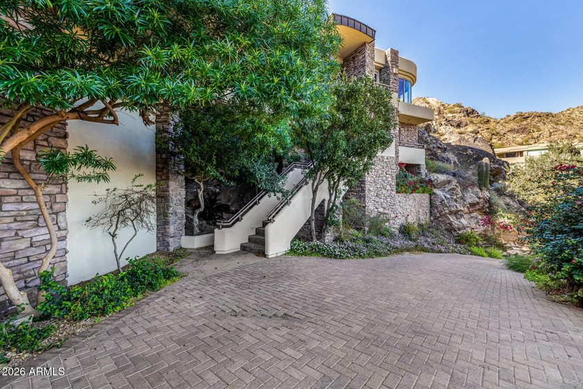 !!$500,000 below appraisal!! Perched atop Mummy Mountain in the - photo 3