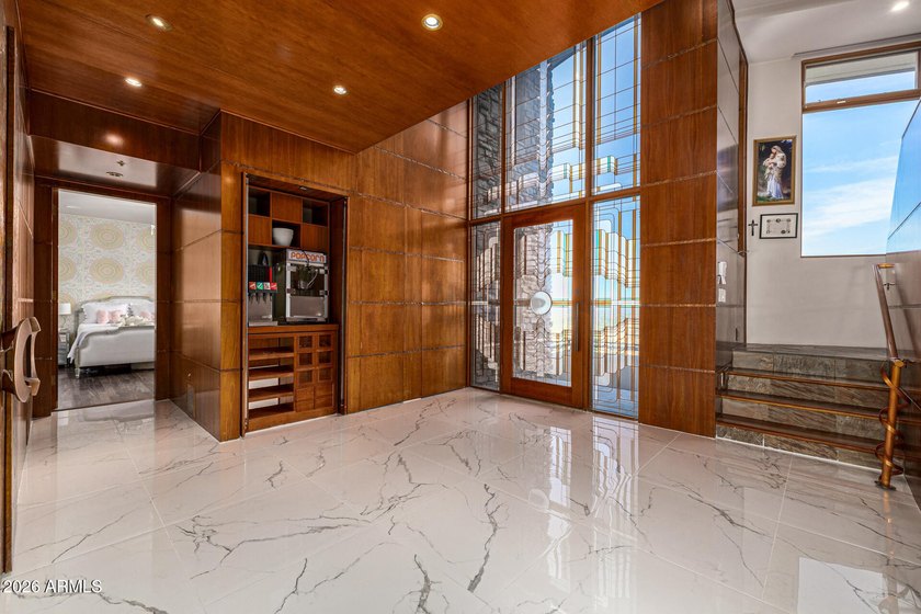 !!$500,000 below appraisal!! Perched atop Mummy Mountain in the - photo 10
