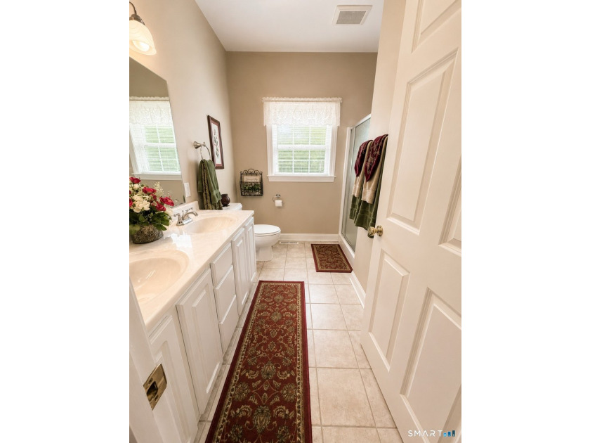 Situated on over an acre of manicured grounds, this custom-built - photo 17