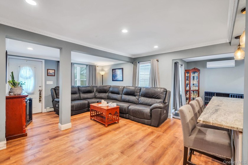 Welcome to 76 Huntington Drive, a beautifully updated 3-bedroom - photo 4
