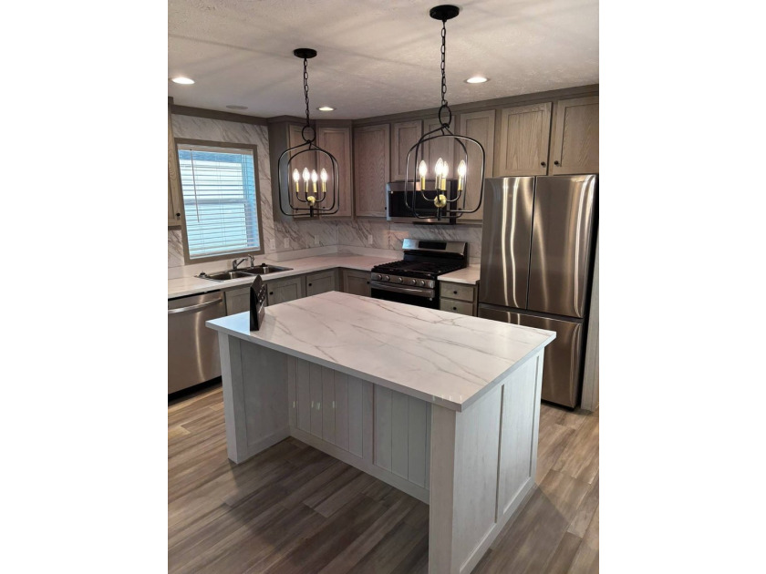 Welcome to this beautifully crafted 3-bedroom, 2-bath home at - photo 7