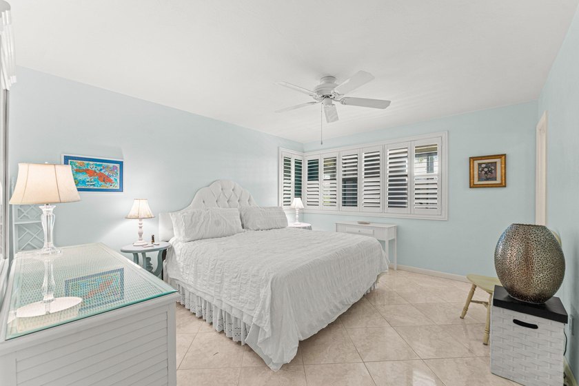 Location truly is everything. Just steps from the beach, this - photo 15