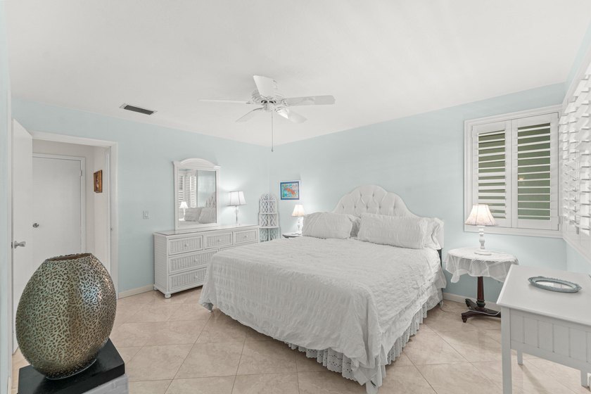 Location truly is everything. Just steps from the beach, this - photo 16