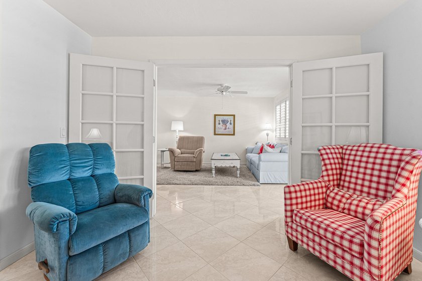 Location truly is everything. Just steps from the beach, this - photo 21
