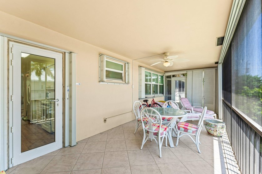 Location truly is everything. Just steps from the beach, this - photo 25