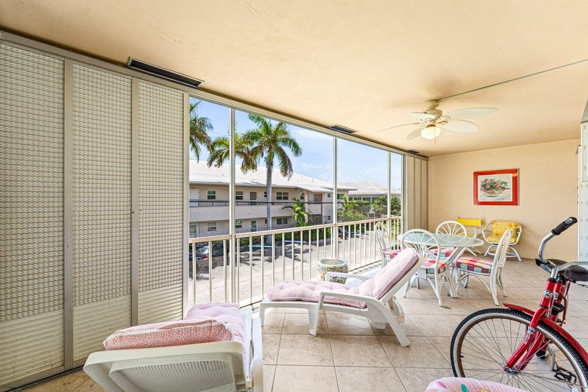 Location truly is everything. Just steps from the beach, this - photo 26