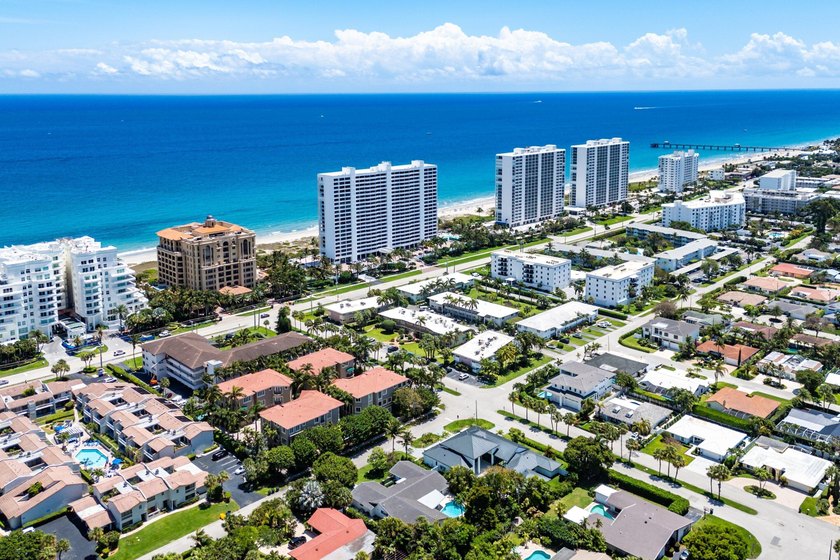 Location truly is everything. Just steps from the beach, this - photo 32
