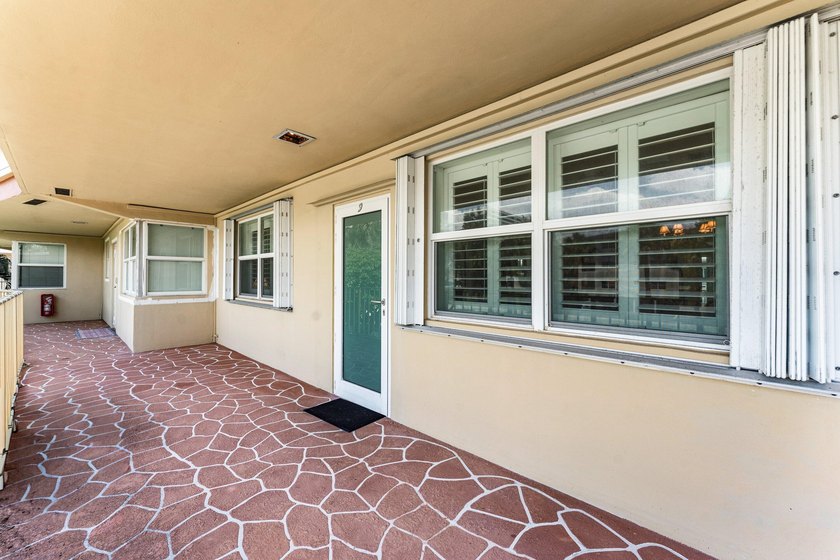 Location truly is everything. Just steps from the beach, this - photo 35