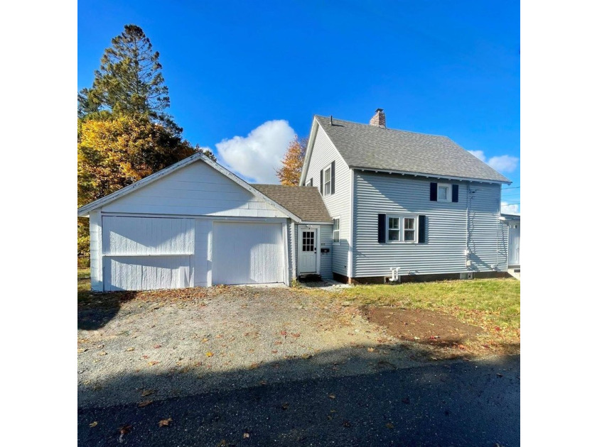Step into this cozy 2-bedroom, 1.5-bath New Englander, where - photo 2