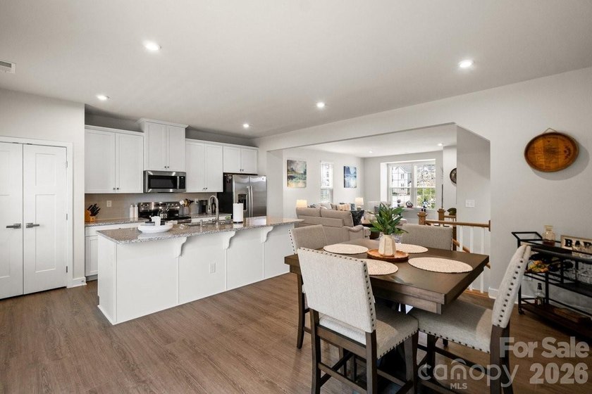 Welcome to this beautifully appointed corner unit townhome in - photo 10
