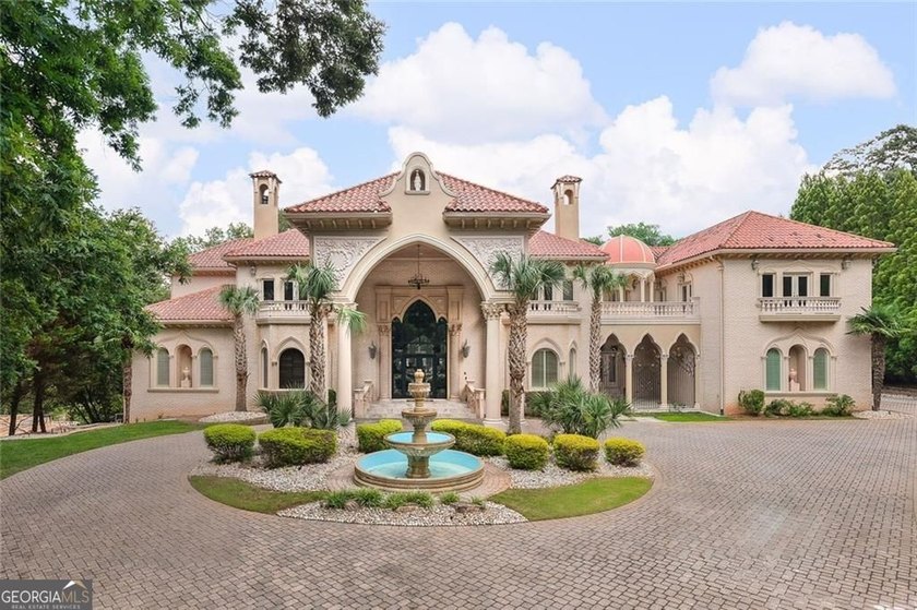 Welcome to one of Atlanta's most extraordinary estates, where - photo 2