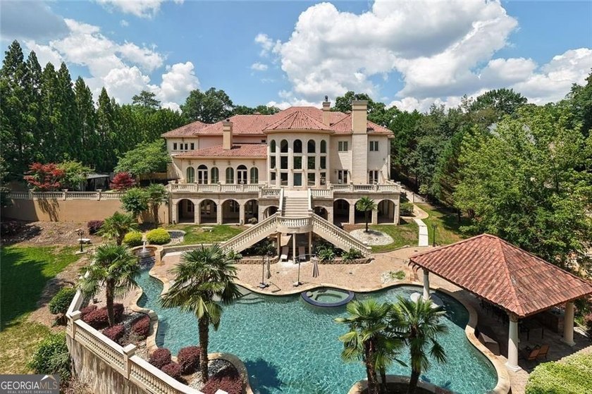 Welcome to one of Atlanta's most extraordinary estates, where - photo 3