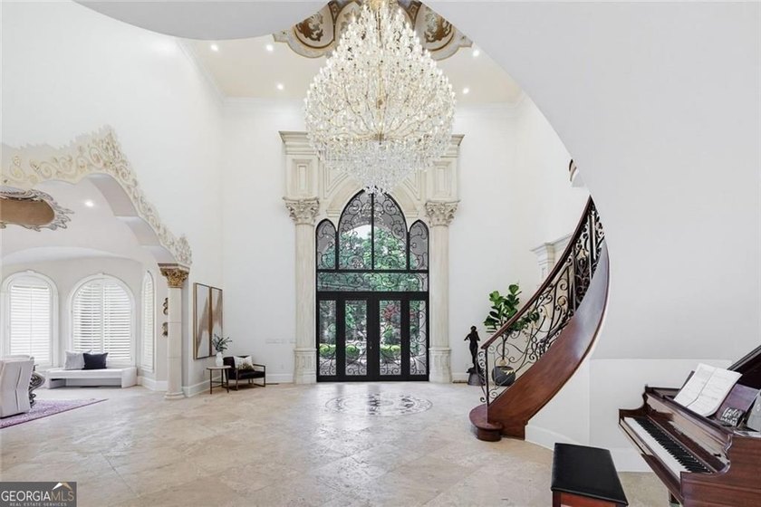 Welcome to one of Atlanta's most extraordinary estates, where - photo 5